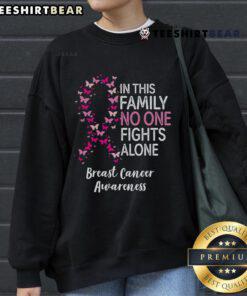 Good Breast Cancer Awareness sweatshirt featuring a butterfly and the message 'In This Family, No One Fights Alone.'