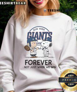 Good New York Giants Charlie Brown Snoopy sweatshirt featuring 'Giants Forever, Not Just When We Win' slogan.