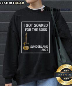 Happy I Got Soaked for the Boss Sunderland 2024 sweatshirt in vibrant colors worn by a smiling person outdoors.