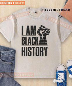 Alt Text: Hot I Am Black History Fist Washed T-Shirt featuring a bold fist graphic celebrating Black history and culture.