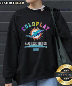 Limited edition 2025 Miami Dolphins x Coldplay sweatshirt featuring bold graphics and vibrant colors.