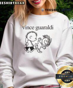 Cozy Vince Guaraldi Peanuts sweatshirt featuring iconic characters, perfect for fans of the beloved comic strip.
