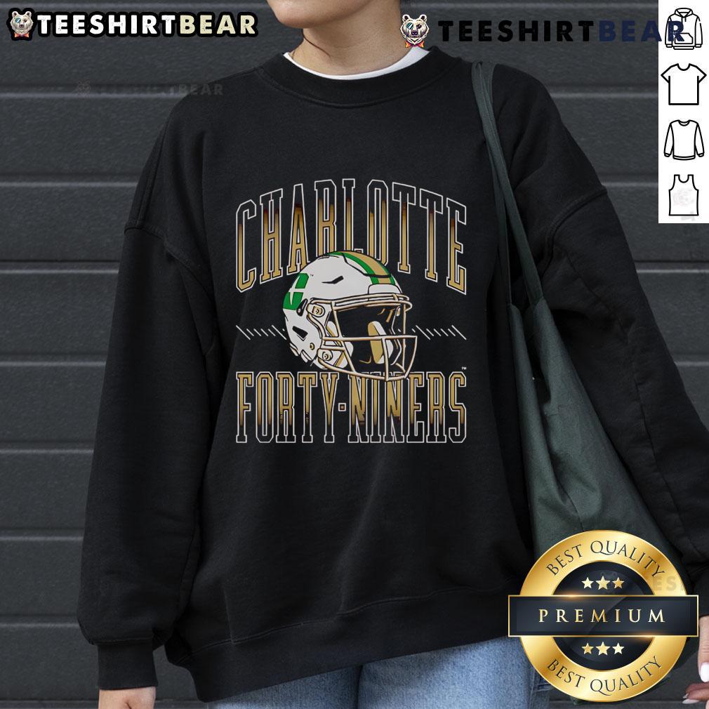 Official Charlotte 49ers football helmet sweatshirt, showcasing team colors and logo for fans and supporters.