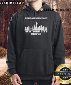 Zohran Mamdani wearing a stylish New York City Mayor hoodie, showcasing support for his campaign in NYC.