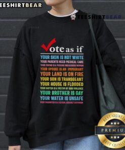 Premium Vote sweatshirt advocating for racial equality and healthcare access, featuring bold text design.