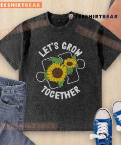 Pretty Let's Grow Together sunflower puzzle piece t-shirt for Autism Awareness, showcasing a colorful design on a washed backdrop.