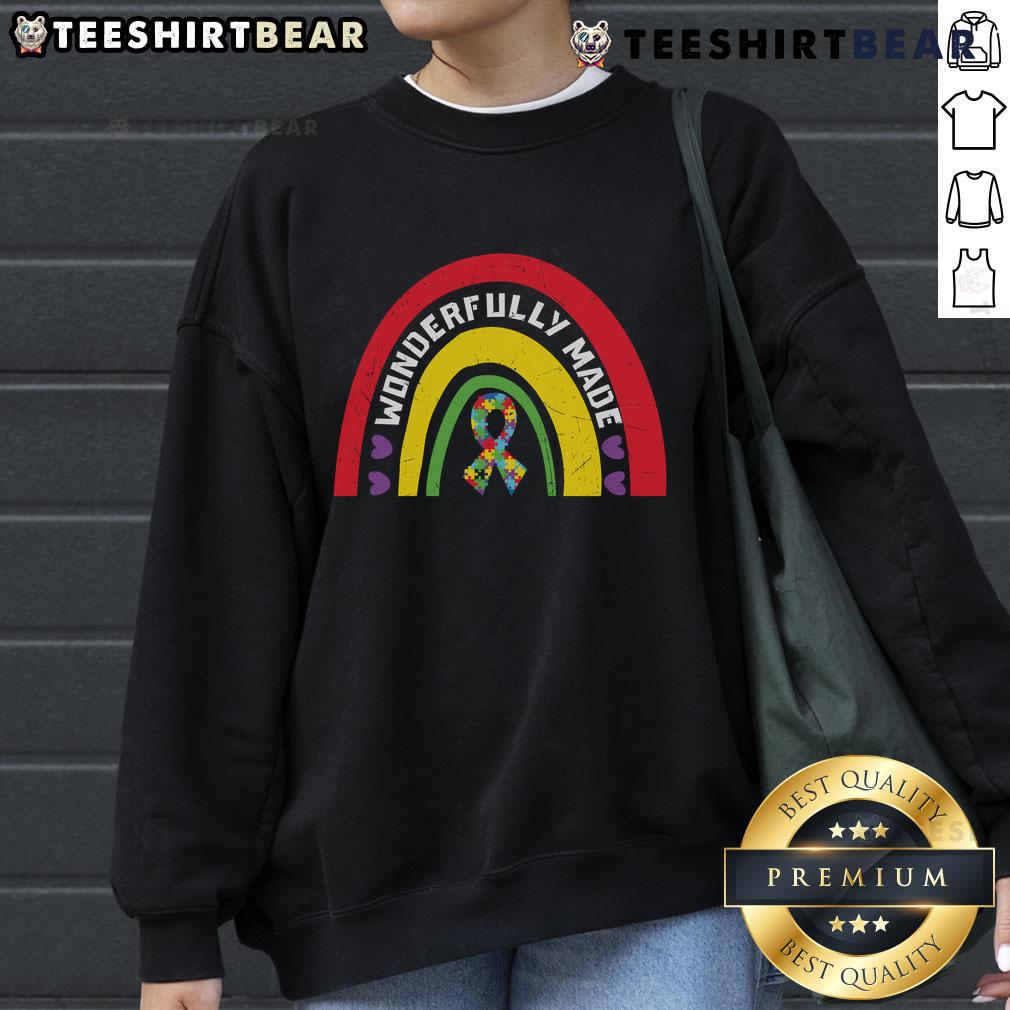 Colorful rainbow sweatshirt featuring a pretty ribbon puzzle design, perfect for casual wear and unique fashion style.