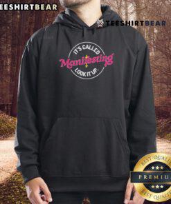 Top Anna Przy It's Called Manifesting Look It Up Hoodie featuring a stylish design and inspirational message.