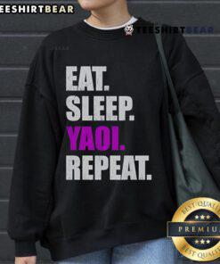 Alt Text: Cozy 'Top Eat Sleep Yaoi Repeat 2025' sweatshirt in vibrant colors, perfect for anime lovers and casual wear.