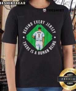 Top Human Behind The Jersey: There Is A Human Being Ladies Tee showcasing a stylish graphic tee for women.