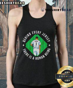 Top human behind the jersey: There is a human being tank top showcasing a vibrant design perfect for casual wear.