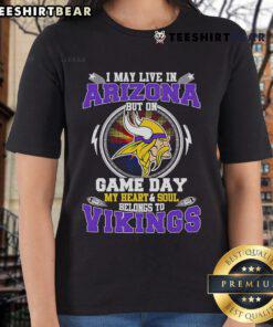 Arizona fan wearing a Minnesota Vikings ladies tee on game day, showcasing team spirit and loyalty.