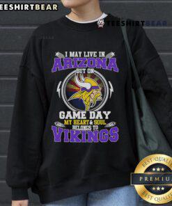 Alt Text: Minnesota Vikings sweatshirt with I may live in Arizona but my heart belongs to the Vikings design on display.