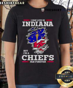 Top I May Live In Indiana But I'm A Kansas City Chiefs Fan Forever Ladies Tee showcasing team pride and style.