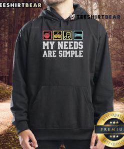 Cozy hoodie featuring 'My Needs Are Simple' graphic with ramen, video game, music, and sleep themes.