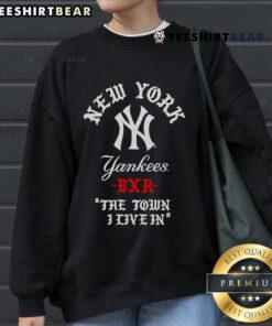 Alt Text: Top New York Yankees Raised in New York Town sweatshirt featuring classic logo, perfect for fans and casual wear.