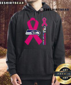 Alt Text: Top Seattle Seahawks X Cancer Awareness 'Im a Survivor' hoodie featuring bold graphics and supportive message.