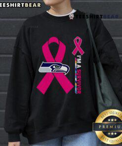 Top Seattle Seahawks X Cancer Awareness 'I'm A Survivor' sweatshirt showcasing team spirit and support for cancer survivors.
