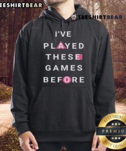 Top Squid Game hoodie featuring iconic game graphics, perfect for fans who have played these games before.