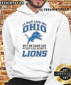 Alt Text: Ohio fan wearing Detroit Lions hoodie, showcasing team spirit on game day with pride and enthusiasm.