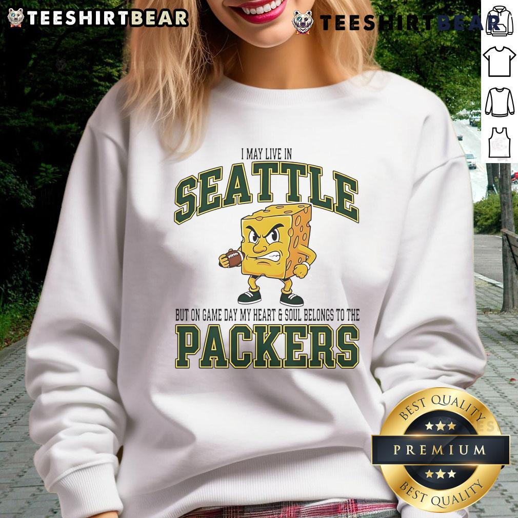 Green Bay Packers sweatshirt worn proudly in Seattle, showcasing team spirit on game day.