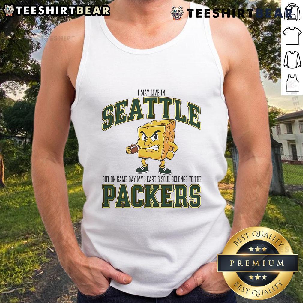 Alt Text: Woman in a Green Bay Packers tank top, showcasing team spirit on game day in Seattle.