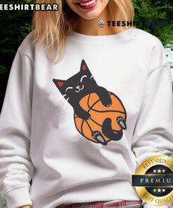 Adorable cat wearing a cute basketball sweatshirt, perfect for pet lovers and sports fans.