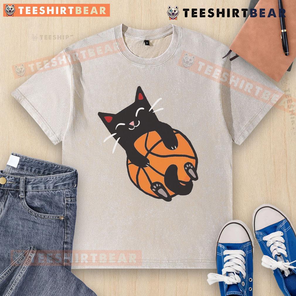 Adorable cat wearing a washed T-shirt with a basketball design, showcasing a playful and sporty vibe.