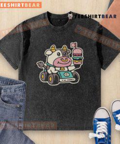 Cute cow burger racer graphic on a washed t-shirt, perfect for fast food lovers and casual wear enthusiasts.