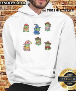 Cute frogs in cowboy and witch costumes wearing a fun hoodie, perfect for frog lovers and quirky fashion enthusiasts.