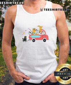 Adorable pets traveling in style wearing a pretty tank top, showcasing cute fashion for pet lovers on the go.
