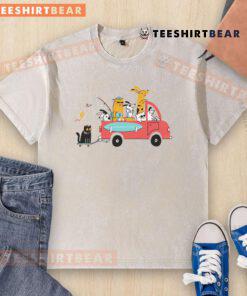 Cute pets traveling while wearing a pretty washed t-shirt, showcasing their adventurous spirit and adorable style.
