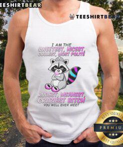 Alt Text: Cute raccoon wearing a tank top with a playful expression, embodying the sweetest and nicest vibe.