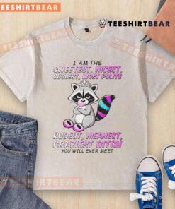 Cute raccoon wearing a I Am The Sweetest, Nicest, Coolest t-shirt, showcasing its adorable personality and charm.