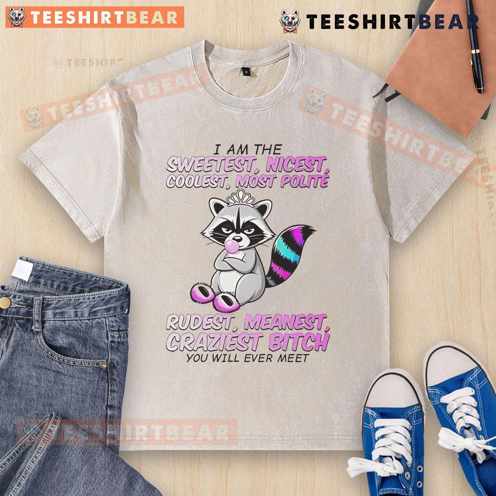 Cute raccoon wearing a I Am The Sweetest, Nicest, Coolest t-shirt, showcasing its adorable personality and charm.