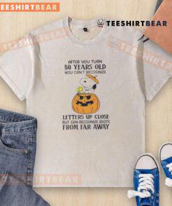 Cute Snoopy t-shirt design for those over 50, humorously depicting difficulty recognizing letters up close.
