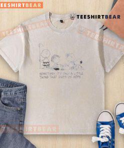 Cute Snoopy and friends on washed t-shirt with the phrase about hope, perfect for casual wear and dog lovers.