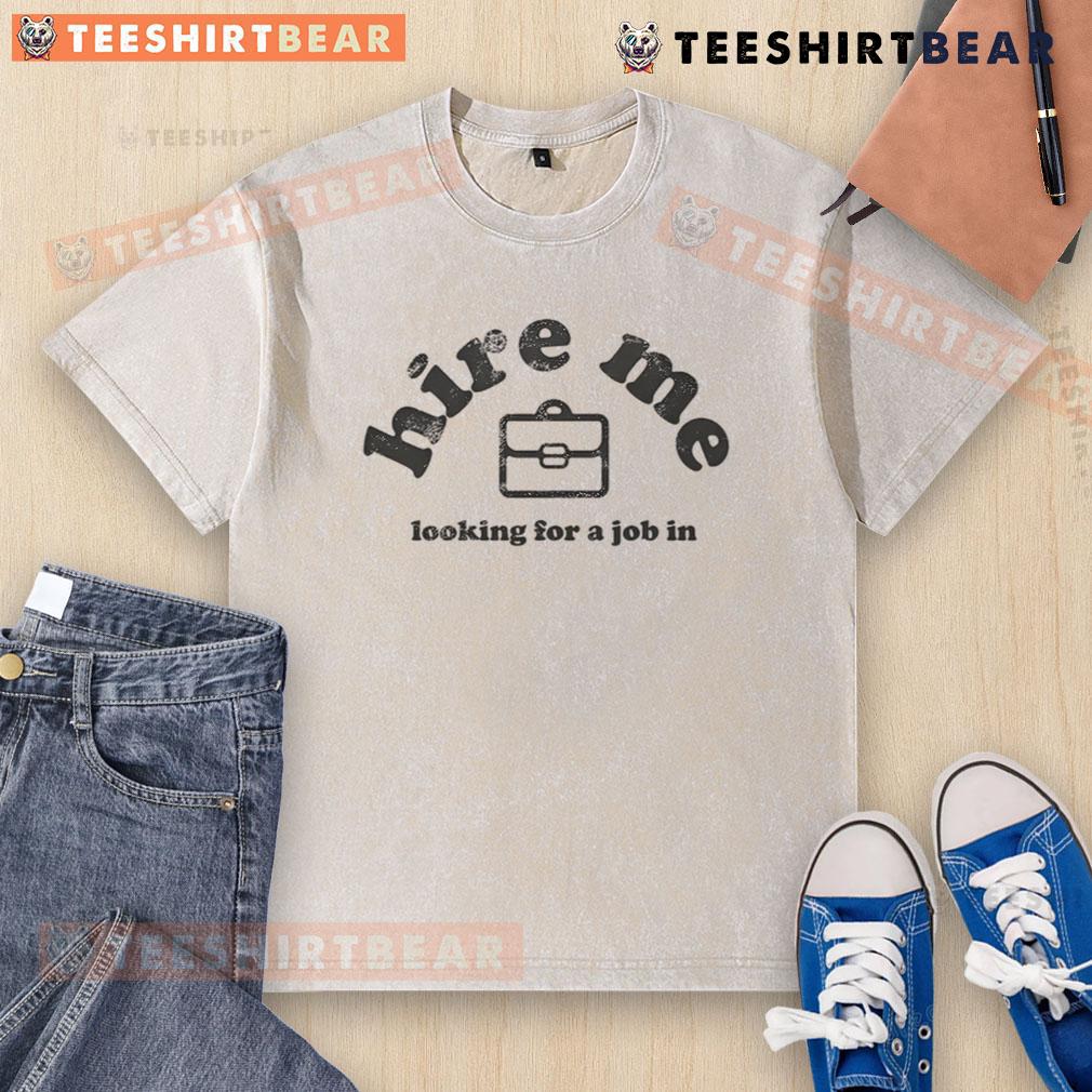 Funny 'Hire Me' job seeker in a washed t-shirt, showcasing humor and personality in a job search image.