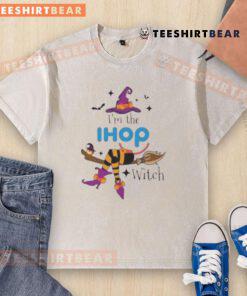 Funny 'I'm the IHOP Witch' Halloween washed t-shirt design featuring a whimsical witch and IHOP-themed graphics.