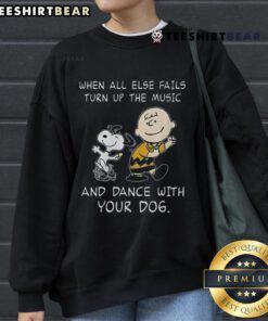 Alt Text: Funny Peanuts Snoopy sweatshirt featuring 'When all else fails, turn up the music and dance with your dog' design.