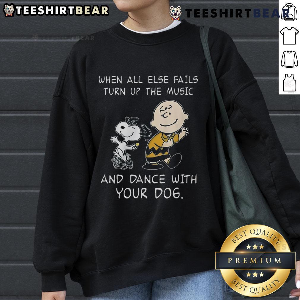 Alt Text: Funny Peanuts Snoopy sweatshirt featuring 'When all else fails, turn up the music and dance with your dog' design.