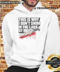 Funny hoodie design: 'This Is Why I Dont Swim In The Lake At Night' featuring a killer knife graphic.