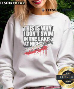 Alt Text: Funny 'This Is Why I Don't Swim In The Lake At Night' Killer Knife Sweatshirt design, perfect for humor lovers.