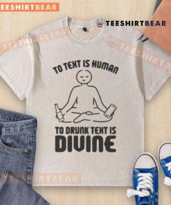 Funny washed t-shirt featuring 'To text is human, to drunk text is divine' slogan, perfect for humorous casual wear.