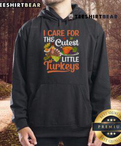 Alt Text: Cute 'Good I Care For The Cutest Little Turkeys' hoodie featuring adorable turkey graphics, perfect for Thanksgiving.