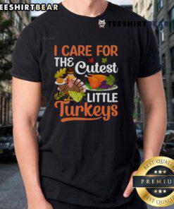 Good I Care For The Cutest Little Turkeys T-Shirt featuring adorable turkey graphics in vibrant colors, perfect for Thanksgiving.