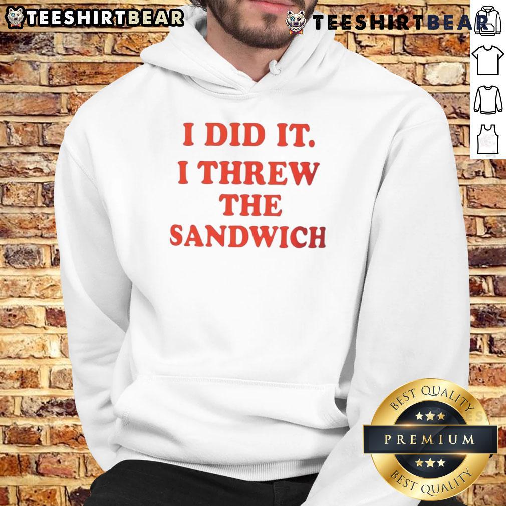Person wearing a 'Good I Did It I Threw The Sandwich' hoodie, showcasing a fun and playful design in a casual setting.