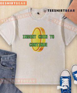 Good Insert Coin to Continue gold pixel washed t-shirt featuring retro game graphics on a stylish casual tee.