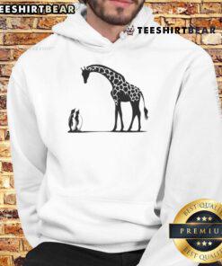 Happy penguin and giraffe design on 'Tall and Small' hoodie, perfect for cozy and fun winter fashion.
