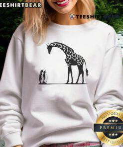 Happy penguin and giraffe graphic on Tall and Small sweatshirt, perfect for cozy casual wear.